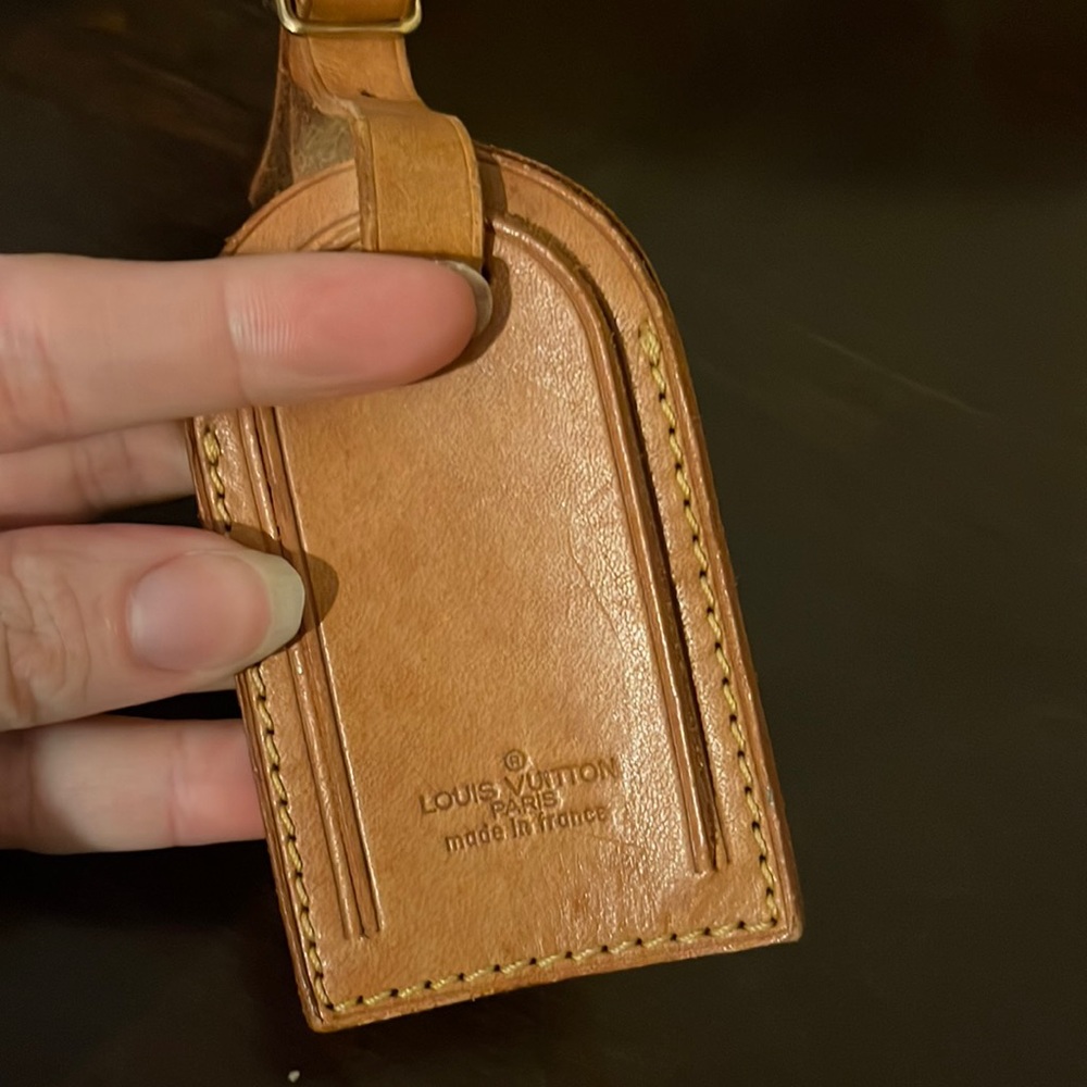 Louis Vuitton luggage tag.  Authentic.